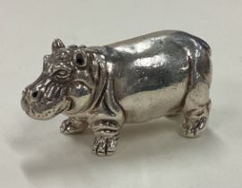 A Sterling silver figure of a hippo.