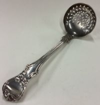 EXETER: A Victorian silver sifter ladle. 1846.