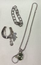 A heavy silver flat link bracelet, pendant and brooch.