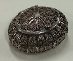 An 18th Century silver filigree snuff box with hinged lid.