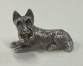 A Sterling silver figure of a dog.