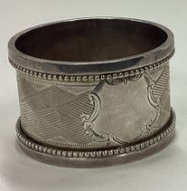 CHESTER: An engine turned silver napkin ring.