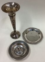 Two silver pin dishes together with a spill vase.