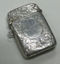 A Victorian silver vesta case with engraved decoration.