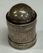 A George III silver nutmeg grater.