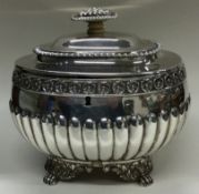 A good 19th Century George III silver lidded tea caddy with interior double compartment.