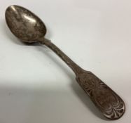 GLASGOW: A Victorian Scottish silver spoon with engraved decoration.