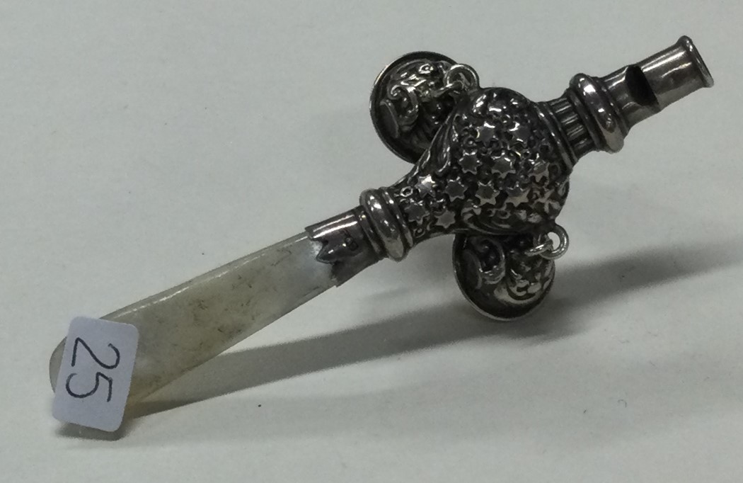 A silver baby's rattle with MOP handle.