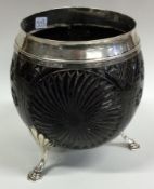 An early 18th/19th Century Scottish silver mounted coconut cup.