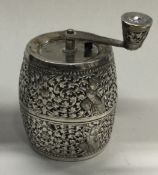 A rare 19th Century Thai silver pepper grinder.