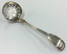 A Victorian silver sifter spoon.
