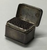 A George III silver nutmeg grater.