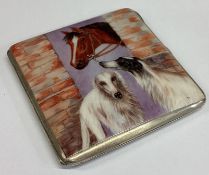 A silver and enamelled cigarette case depicting horse and dogs.