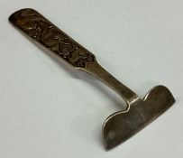 DAVID ANDERSEN: A silver pusher embossed with animals.