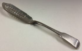 A rare Georgian silver server with pierced decoration.