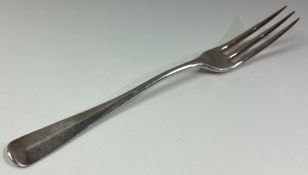 An 18th Century three-pronged silver fork.