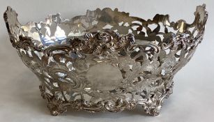 An attractive pierced silver basket decorated with