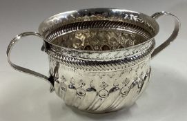 An early style Victorian silver porringer.