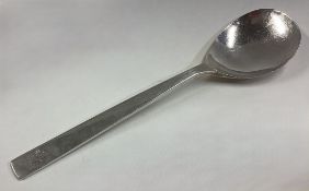 A large silver spoon.