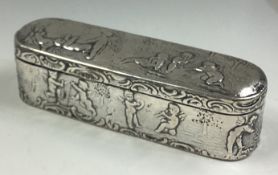 A Victorian silver snuff box embossed with cherubs bearing import marks.