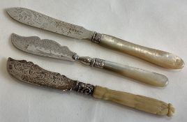 A good group of three silver mounted butter knives.
