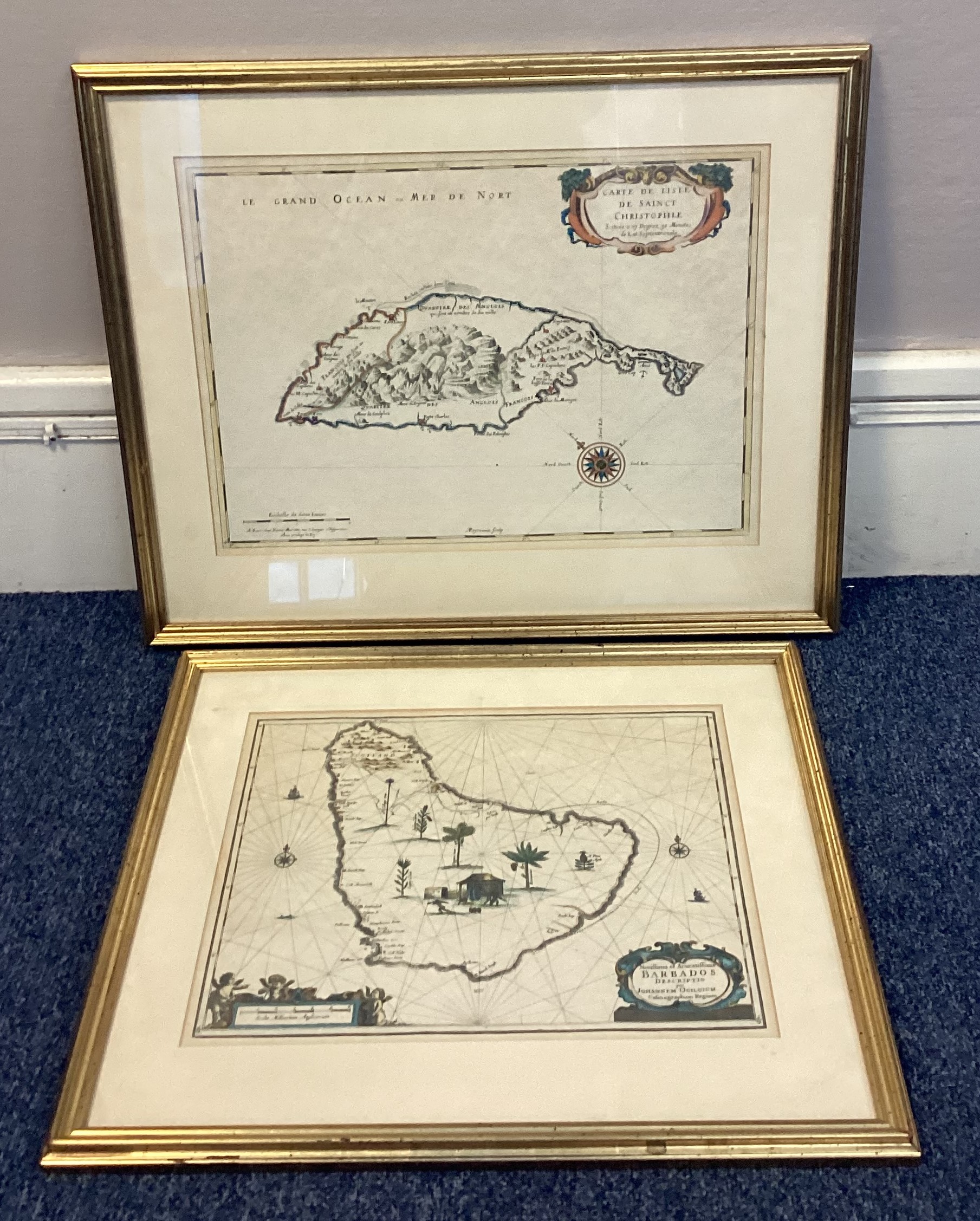A pair of gilt framed reproduction maps of Barbados and St Christopher Island.