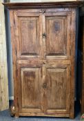 A good Continental hardwood four-door cupboard. Es