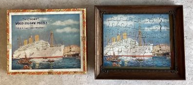A framed wooden jigsaw entitled 'Victory depicting the P&O Line 'Strathnaver'.