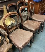 A set of six mahogany hoop back chairs.