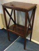 An Edwardian mahogany two-tier buffet table.