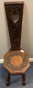 A small carved Welsh spinning chair.