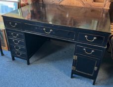 A good 20th Century lacquered twin pedestal desk.