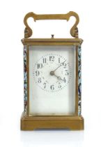 A late 19th/early 20th century repeater carriage clock, the movement striking on a gong, the