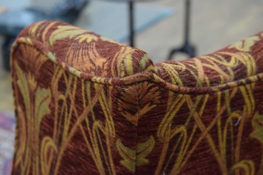 A mahogany wingback armchair upholstered with an Art Nouveau pattern, on Chippendale style legs - Image 15 of 19