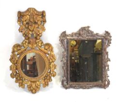 Two 20th century giltwood and limed wall mirrors, one bearing a label to the rear of the mirrored