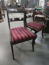 A group of chairs including a pair of William IV sabre-leg dining chairs, a pair of Georgian