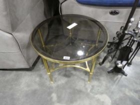 Circular brass occasional table with smoked glass surface