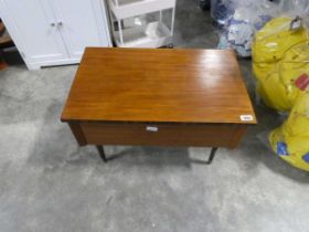 Mid century teak work/sewing box on black tapered supports, manufactured by C. Arnold Ltd.,