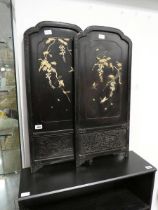 Pair of oriental black painted wall hangings with carved bone decoration