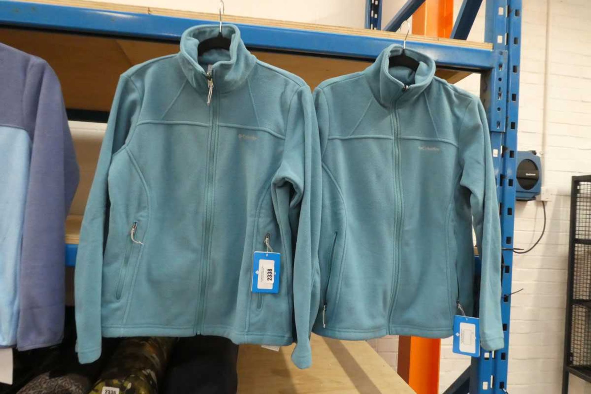 +VAT Pair of Columbia blue zip up fleeces (size M)