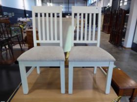 Modern pair of off white and grey upholstered dining chairs