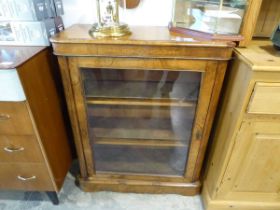 Walnut singled door glazed display cabinet