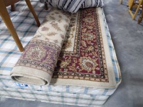 Modern maroon and beige figured and bordered Agra rug, 160 x 230cm.
