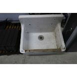 White ceramic butler style sink