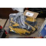 +VAT Bag containing pair of DeWalt black holster pocket work trousers (W32 L32) with quantity of