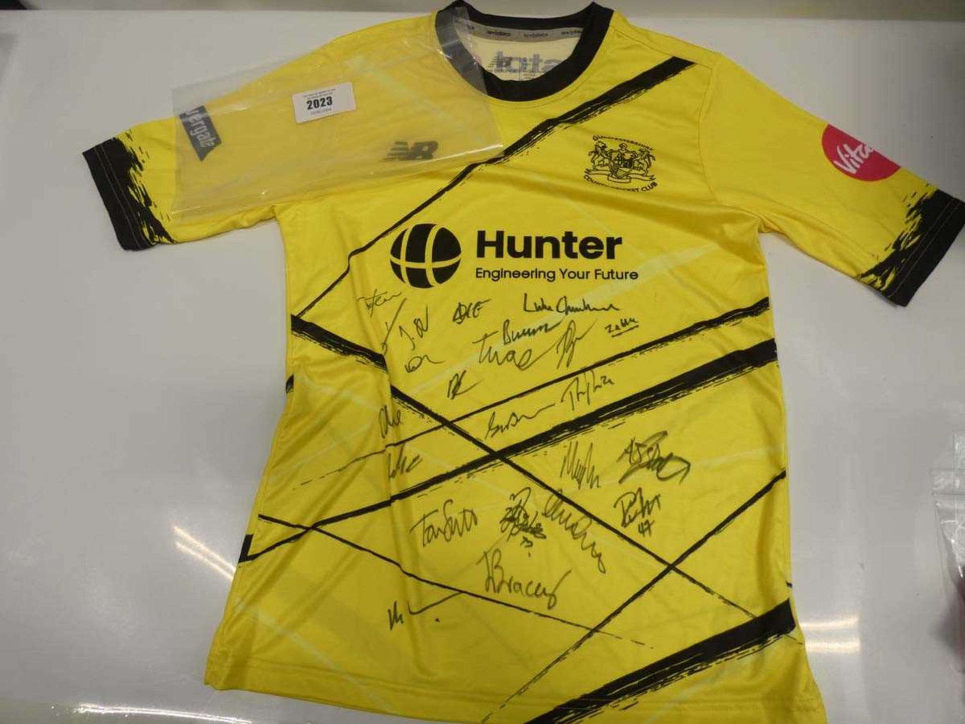 +VAT Gloucestershire County Cricket Club shirt bearing signatures (unverified)