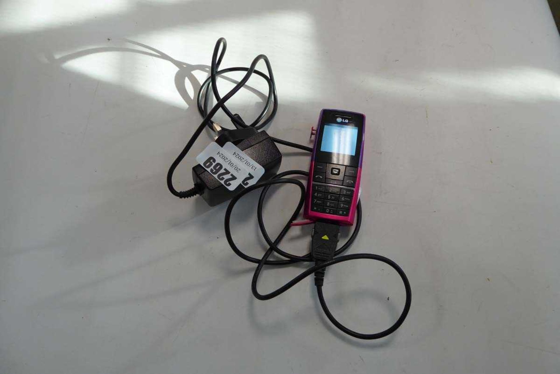 LG mobile phone and charger