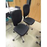 2 black cloth swivel chairs