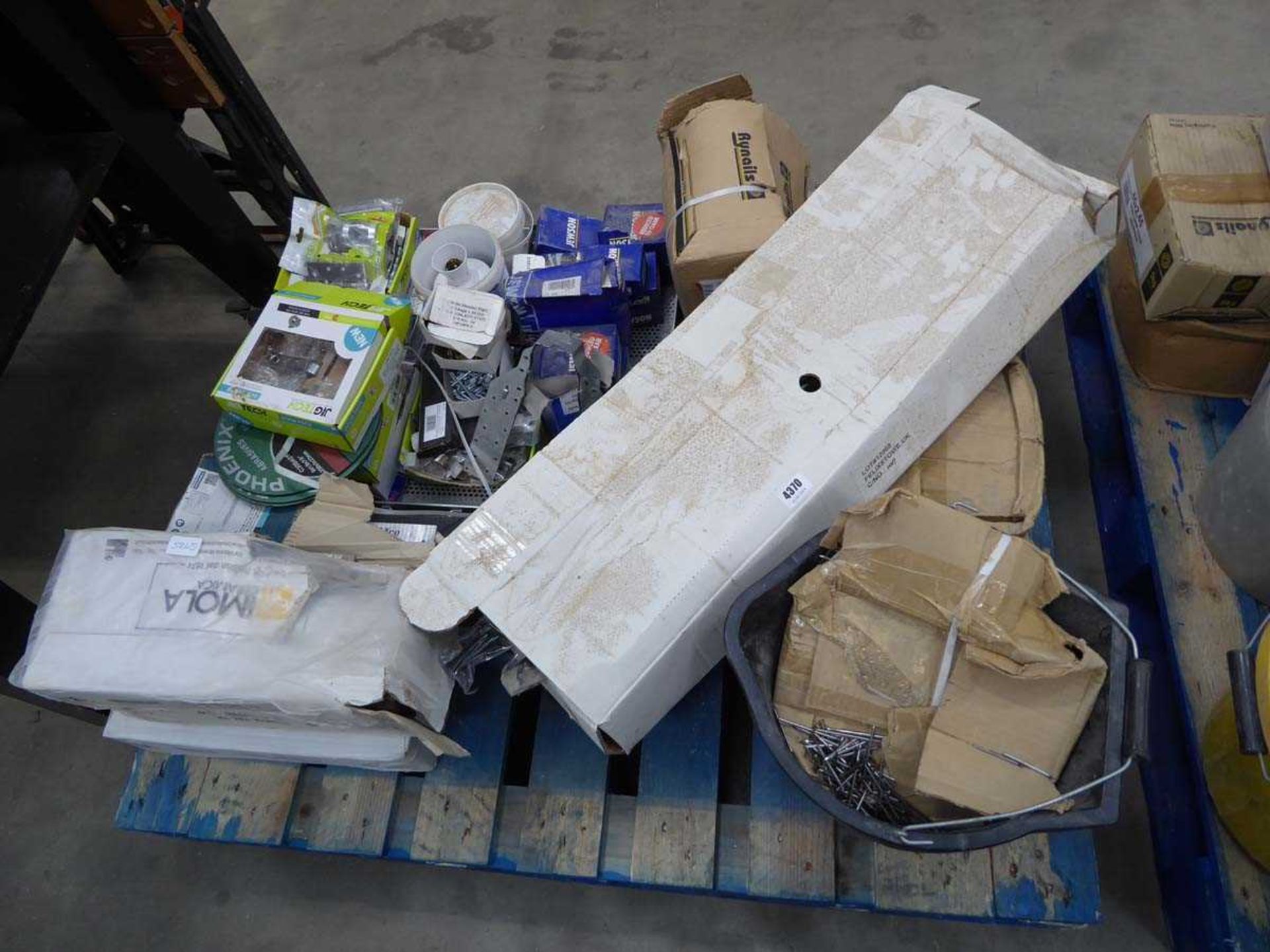 Large pallet containing nails, screws, cutting blades and various other fixings