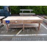 Large woodworking bench with woodworking vice